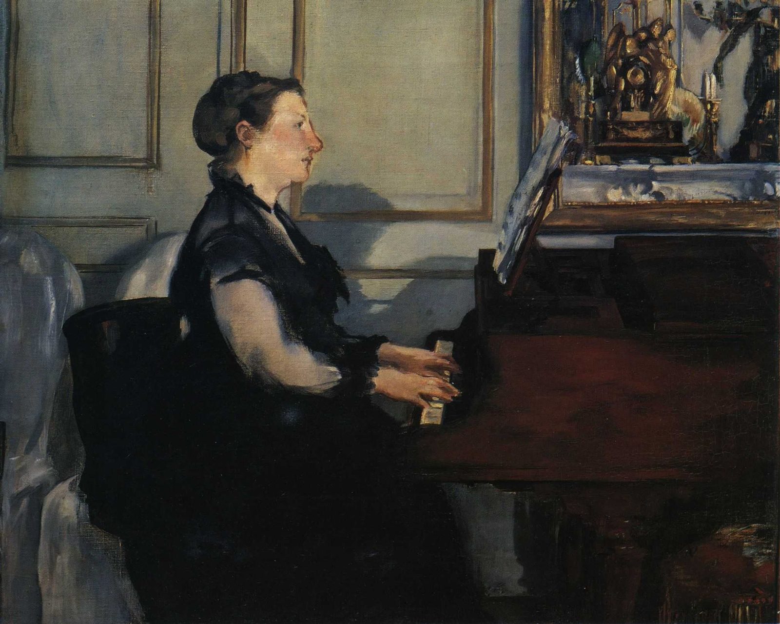Suzanne Manet che suona il pianoforte